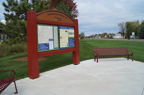 Hardwood Creek Trail signage and bench