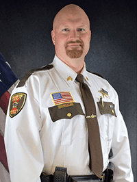 Portrait of Commander Tim Harris in uniform